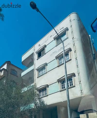Building for sale in the first neighborhood, steps to Al-Hosari and October 6 University