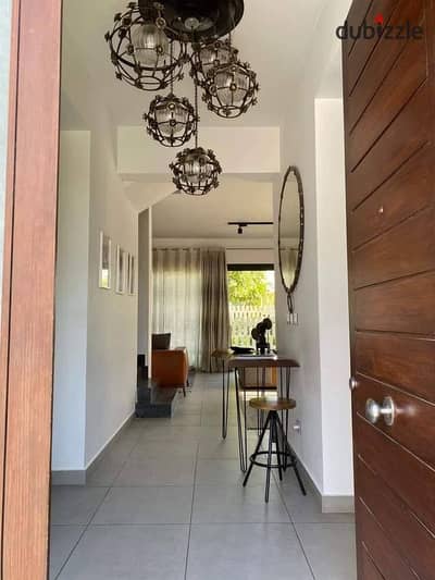 Luxury townhouse for sale, fully finished, in a prime location within the Sodic East compound in New Heliopolis.