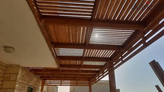 تصميم احداث البرجولات الخشبيه
