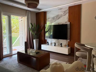 106-square-meter apartment for sale in Madinaty; option to purchase fully furnished. Ground-floor unit with a garden view.