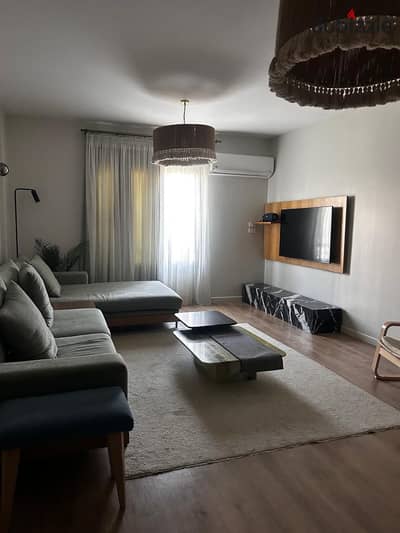 A photo for sale with furniture and appliances, a 90 m apartment in Madinat Al-Rehab, first floor, ultra-super Lux finishes.