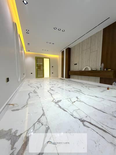 For sale, a 130 sqm ground floor apartment with a private garden next to Al-Awdi Mosque