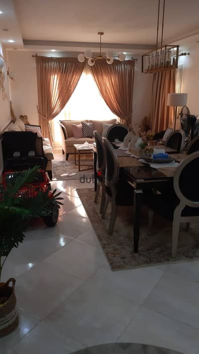 For sale in Dar Misr Al-Qaranful: 130 sqm apartment, 4th floor, custom finishes.