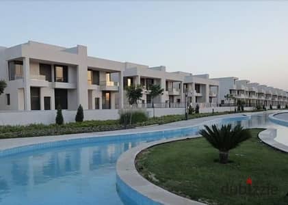 Townhouse villa for sale, ready to move, in Lake West Compound, Sheikh Zayed, in front of Beverly Hills