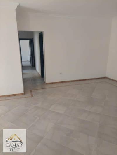 For quick sale in Masaken Misr, Exhibition Grounds area: 115 sq m apartment on the first floor (above ground floor), no elevator.