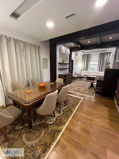 Furnished basement apartment with a 174 sq m garden, ultra-super-lux finishing, for rent in Sephora Heights Compound, Fifth Settlement.