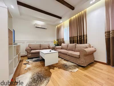 High-end furnished studio with a private garden in B6, located next to amenities, South Park, Al-Haraka, and Strip Mall.