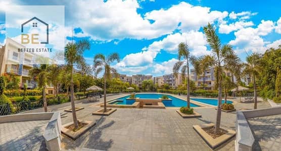 Ground floor apartment with garden for sale in the Golden Square, New Cairo, opposite the American University in Cairo. Apartment + garden plot.