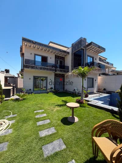Luxury villa for sale with swimming pool, steps away from the main road in King Mariout | Alexandria •