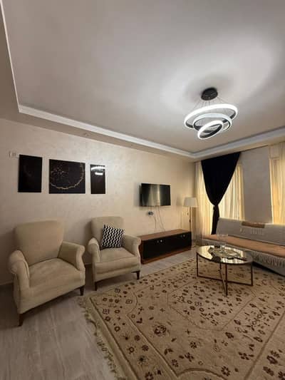 Furnished apartment for rent in Janna October, Sheikh Zayed; includes a kitchen and modern appliances, featuring a prime location and a wonderful view