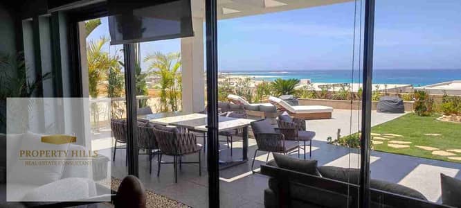 Fully finished chalet for sale minutes from almaza bay in beit elbahr first row looking over the view ready for viewing fully finished ultra modern with kitchen and conditioners , | 135m²  Details:  Unit Type: chalet  Built-up Area: 135m²  Stunning lagoon