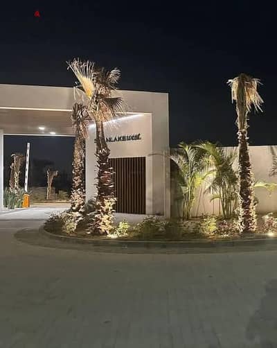 Villa with a unique view on lagoon in Swan Lake Hassan Allam in front of Arkan Sheikh Zayed Near Bamboo , Golf Views , The Crown Palm Hills & New Giza