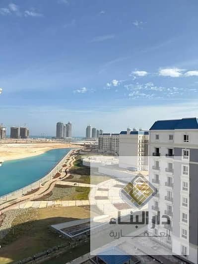ready to move  lagoon view - finished apartment for sale in latin distrect new alamein north coast next to mazarine and marassi  , marina 5