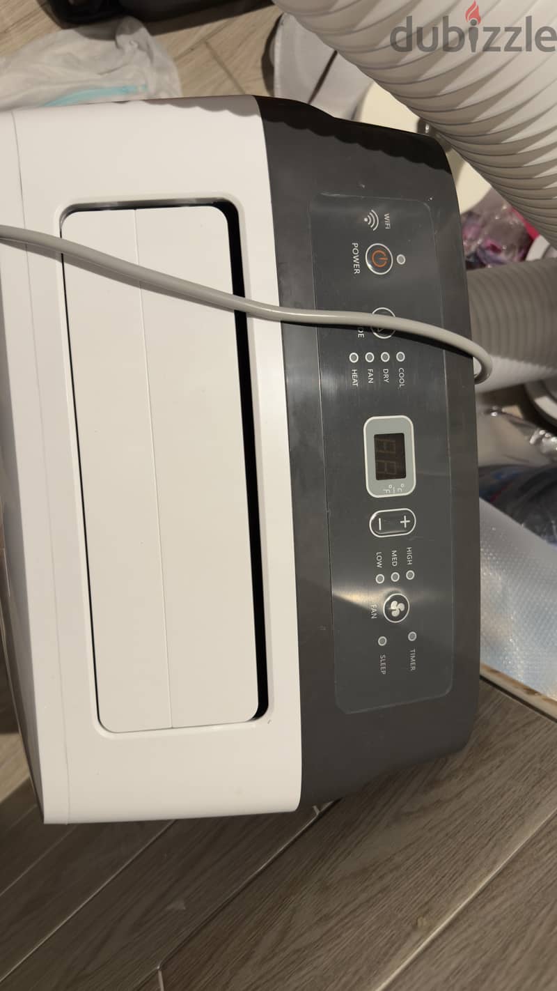 Hisense 1.5 HP hot/cold portable AC 1