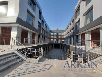 Shop for sale, 28 square meters, with a down payment of 560,000, immediate occupancy, located on the service road next to Rawdat Al-Salmiya and Beit A