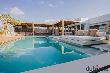 Receive a villa in Mountain View Ras Al Hikmah directly by the sea at a bargain price