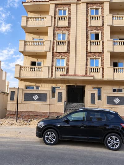 Distinctive apartment on the ground floor with a garden, immediate delivery in a prime location in Al-Nargis Al-Jadeedah