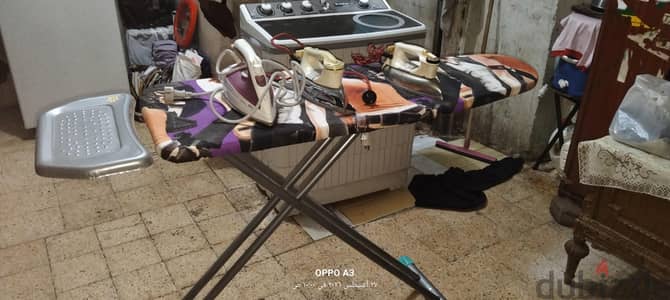 3مكاوي 2ناشونال وواحده براون بخار ومعاهم ترابيزه المكاوي