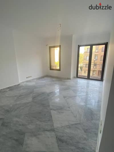 Apartment for rent in Casa Sheikh Zayed compound, including kitchen and air conditioning.