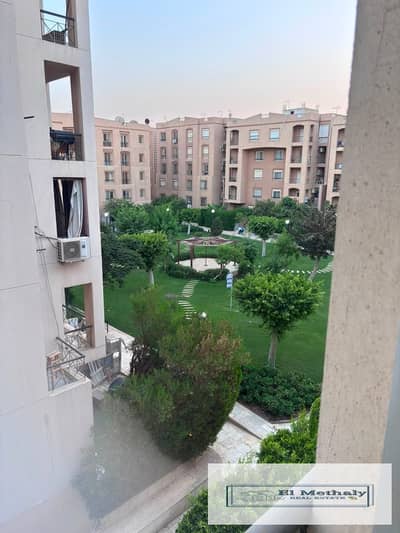 Freehold apartment for sale in Al Rehab City, New Cairo; features a wide garden view and is located near the Old Market and amenities.