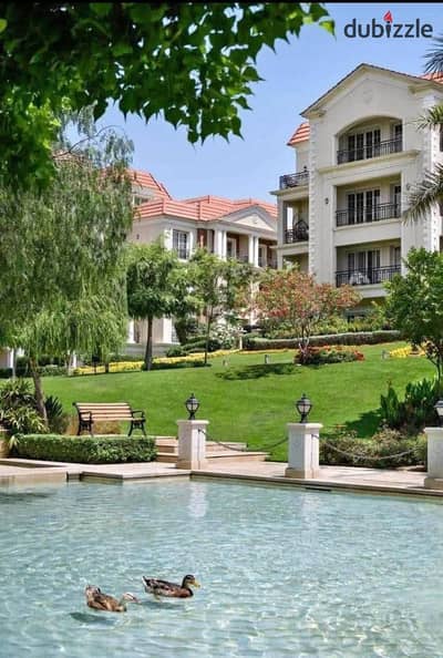 An apartment in a prime location within the Regents Park compound, featuring an open view of the landscape. It is situated in an inhabited