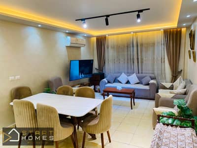 Ground apartment with garden for rent furnished in Madinaty B11, ultra super deluxe finishes