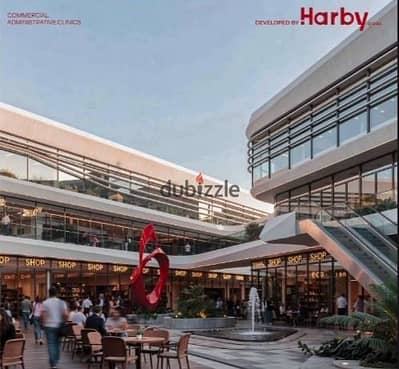 For Sale: 62m² shop in Seven Complex Mall, direct on Zewail Road, opposite Zewail University. 10% down payment, 8-year installments.