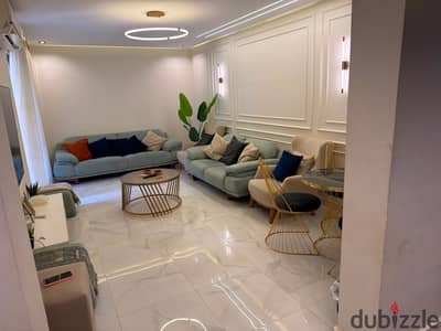 Furnished apartment on the ground floor with a garden for rent in Madinaty