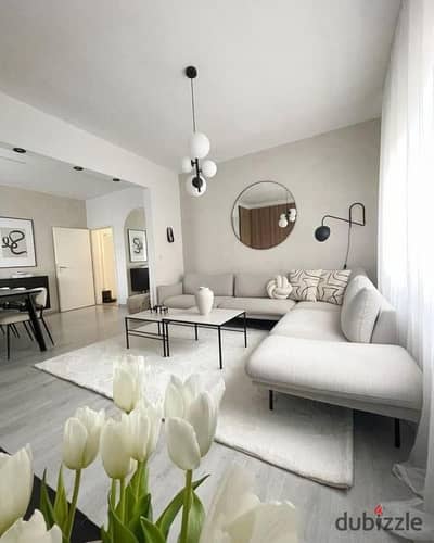 Own an apartment for sale in one of the strongest and most prime locations in Sheikh Zayed, right in the heart of Al Thawra Al Khadra, with a strategi