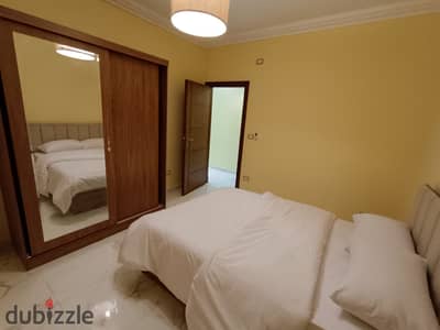 Apartment for rent in the Seventh District, the most upscale district of Sheikh Zayed, at the lowest price ever, furnished and air-conditioned