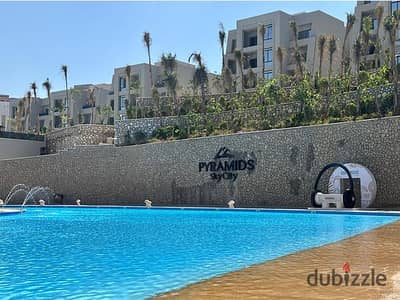 Chalet for sale at Sky City Galala Pyramids Developments: 117 sqm, fully finished and furnished, with a down payment of 250,000.