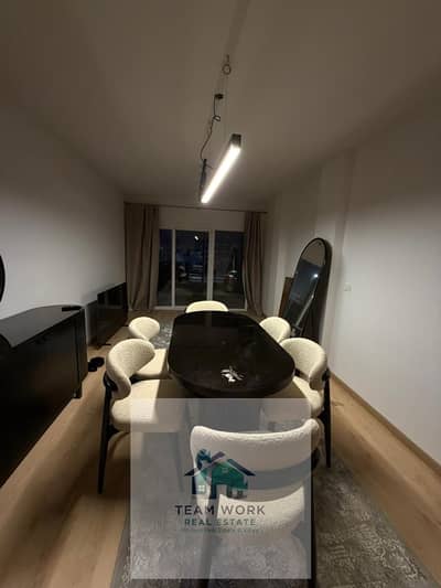 Ground-floor apartment with a garden for sale in Kayan Compound (Badr El-Din): 120 sqm + 170 sqm garden; finished; prime location.