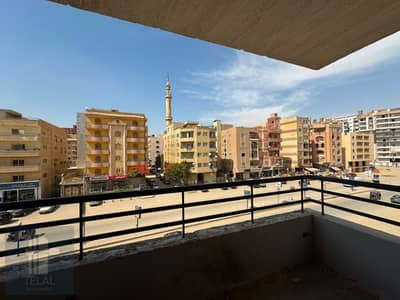 شقه للبيع استلام فورى بالتقسيط بشارع الجامعه الحديثه الرئيسى