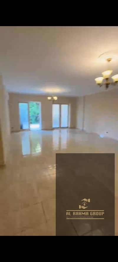 Available for rent (New Law) in Al Rehab: a ground-floor apartment with a garden. Area: 155 sqm + 60 sqm garden. Features 3 bedrooms and 3 bathrooms (