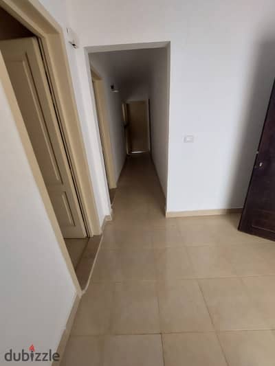 Apartment for rent under the law in Madinaty, ground level with garden view, 149m + 60m garden