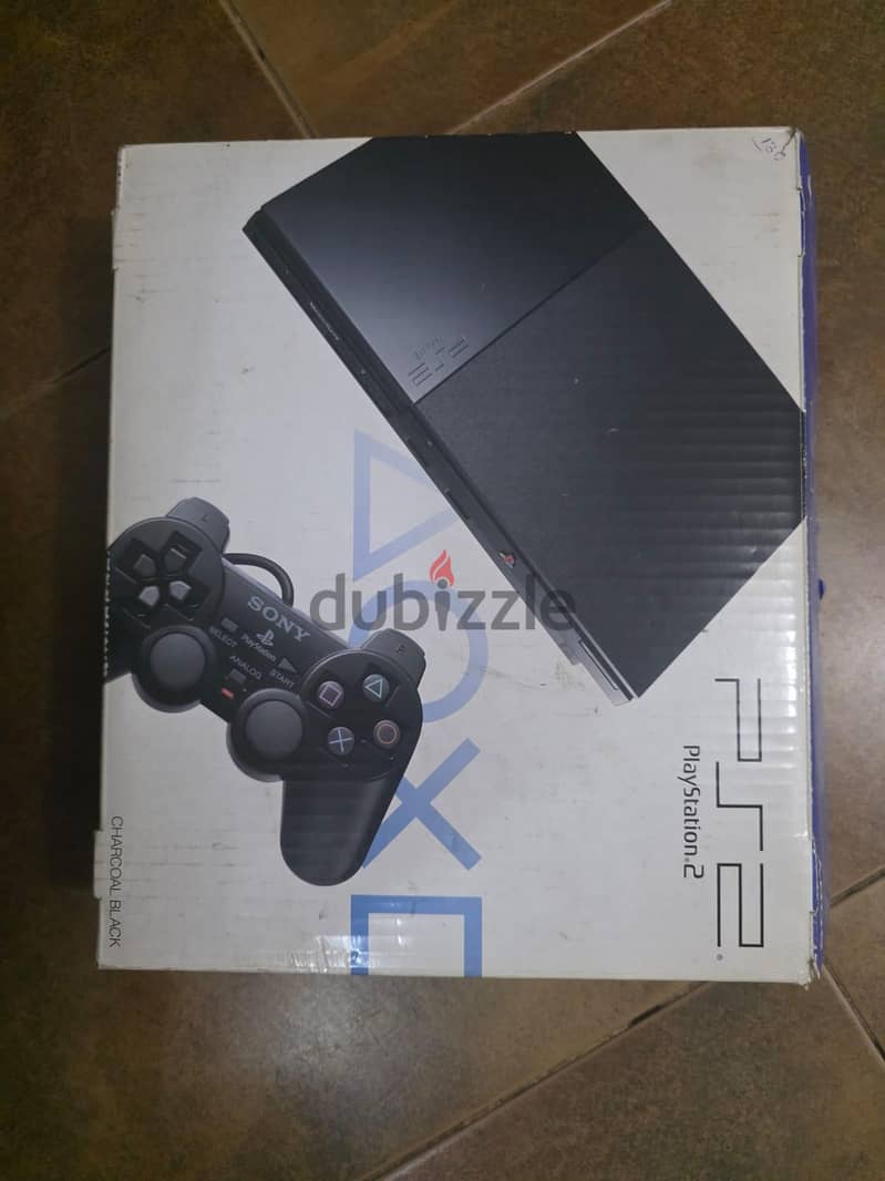 ps2 + games+ stearing wheel 3
