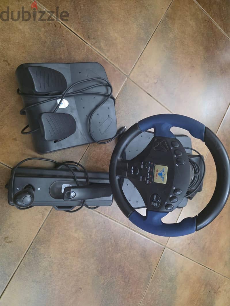 ps2 + games+ stearing wheel 4