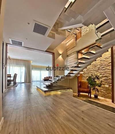 Townhouse for sale, ready for immediate occupancy, fully finished, opposite Kempinski Hotel, with a sea view, inside Taj City compound.