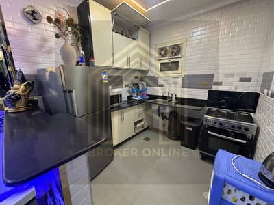 For rent, a furnished apartment on the ground floor with a garden in 6th of October [Green Town Compound]