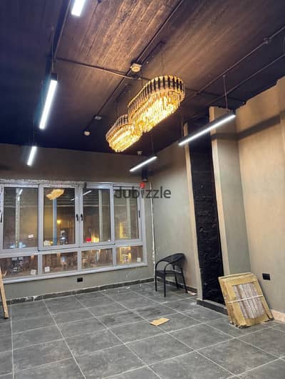 Shop for rent in Craft Zone, Madinaty – 72 sqm interior + 30 sqm outdoor area; fully finished.