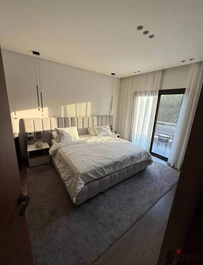 For sale 12 year villa 5 bedrooms with a distinctive garden view in Butterfly on the Suez Road near Mountain View and SODIC.