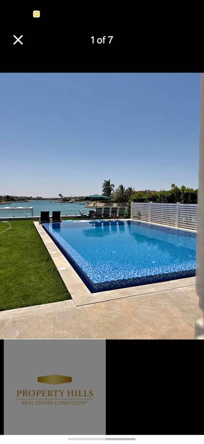 Townhouse for Sale in Marsa Baghous by Shehab Mazhar    First Row Directly on the Sea and Lagoon    Fully Finished and Located in a Prime Position on