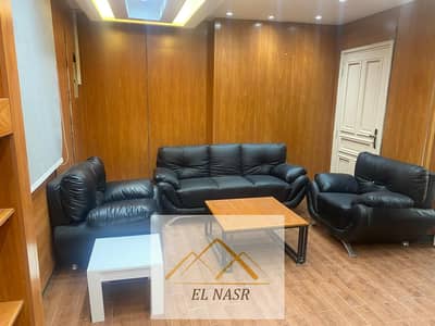 Furnished, air-conditioned ground-floor office with a private entrance and administrative license for rent; located on the Makram Ebeid extension