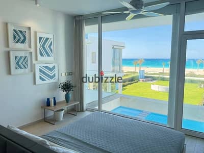 Two-bedroom chalet first row on Crystal Lagoon fully finished with air conditioning for sale Best location on the North Coast minutes from june sodic