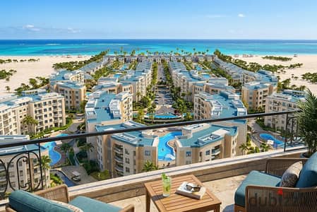 شاليه 120م 3 غرف في الساحل الشمالي في قرية كيو باي تشطيب كامل  مقدم 10% وتقسيط 12 سنة