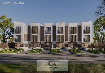 Townhouse for sale in Scenes Compound in the heart of Mostakbal City, next to Bloomfields, with a 5% down payment and installments over the longest pa