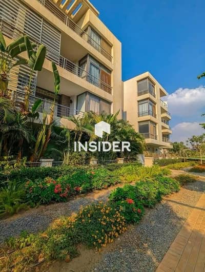 For sale, an apartment at half its price in Taj City compound, in front of Cairo Airport and directly on the Suez Road.
