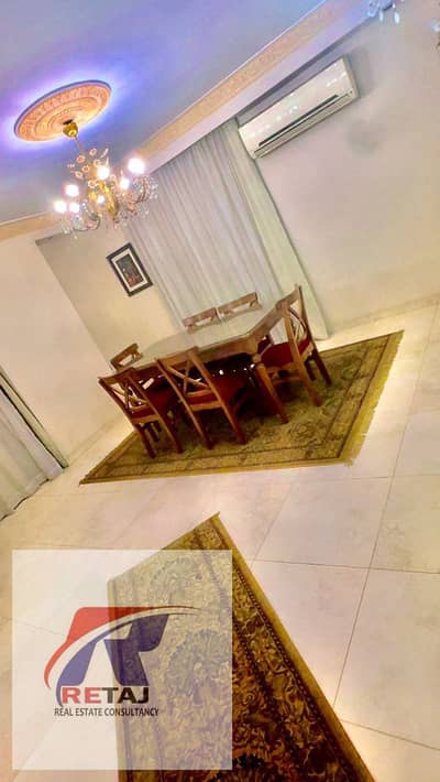 Furnished apartment for rent in a modern tower with a direct and distinctive view of the International Garden, near Abbas El Akkad Street, Nasr City.