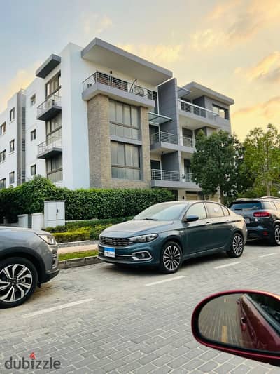 Apartment for sale in the center park in the settlement in front of Cairo International Airport and the Kempinski Hotel in the Taj City Compound