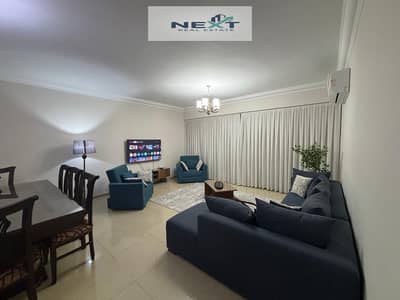 For rent in Madinaty, a furnished apartment of 146 sq m, second floor, high-end finishing, 3 bedrooms + 2 bathrooms. Prime and vibrant location, one m